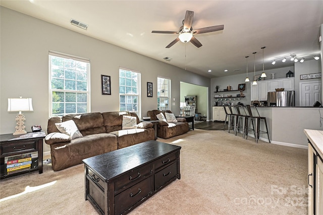 4018 Harmattan Dr, Denver, NC 28037 - living area with a ceiling fan and light colored carpet