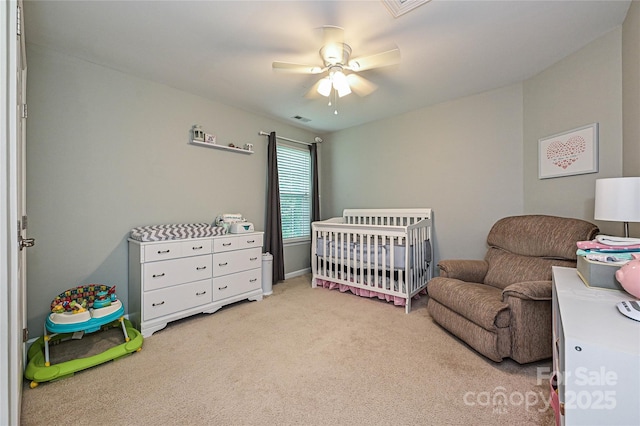 4018 Harmattan Dr, Denver, NC 28037 - carpeted bedroom featuring a nursery area and ceiling fan