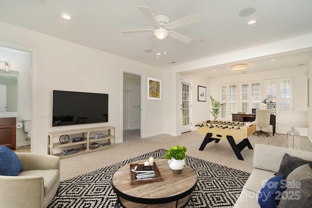 243 Lincoln St, Charlotte, NC 28203 - living room with recessed lighting, a ceiling fan, baseboards, and light colored carpet