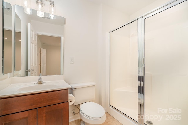 243 Lincoln St, Charlotte, NC 28203 - bathroom featuring a shower stall, toilet, tile patterned floors, vanity, and baseboards