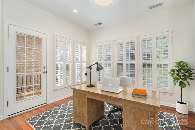 243 Lincoln St, Charlotte, NC 28203 - office space with plenty of natural light, wood finished floors, baseboards, and recessed lighting