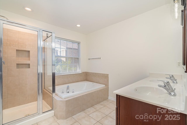 243 Lincoln St, Charlotte, NC 28203 - full bathroom featuring tile patterned flooring, a stall shower, a garden tub, recessed lighting, and double vanity