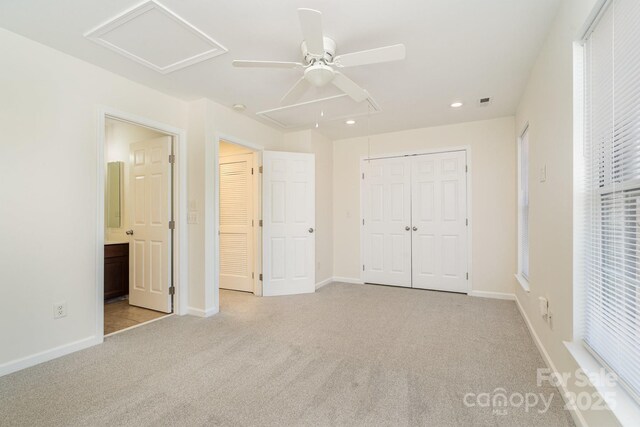 243 Lincoln St, Charlotte, NC 28203 - unfurnished bedroom featuring carpet, a closet, baseboards, recessed lighting, and attic access