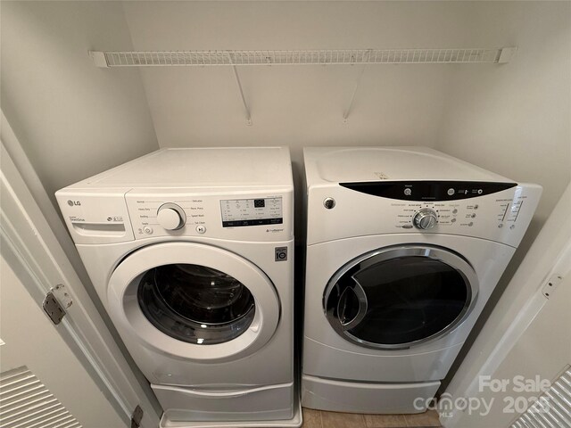 243 Lincoln St, Charlotte, NC 28203 - washroom with independent washer and dryer