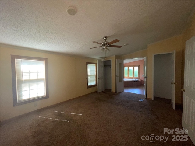 3103 Blue Ridge Dr, Shelby, NC 28150 - carpeted empty room with a textured ceiling, ceiling fan, and vaulted ceiling