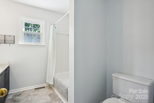 full bathroom featuring vanity, toilet, shower / bath combination with curtain, and baseboards