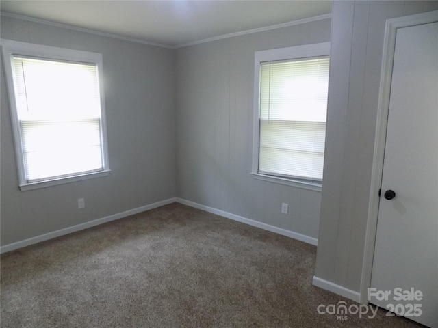 209 Barber Rd, Gastonia, NC 28056 - empty room featuring crown molding, dark colored carpet, and baseboards