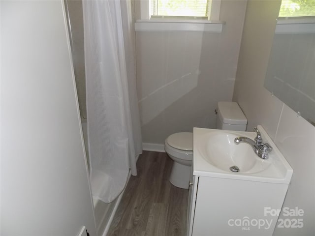 209 Barber Rd, Gastonia, NC 28056 - full bath featuring toilet, wood finished floors, vanity, and shower / bath combination with curtain