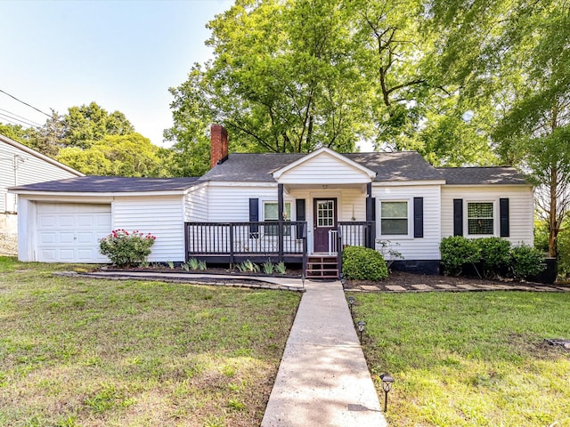 view of front of home with a front lawn, a chimney, a garage, roof with shingles, and crawl space