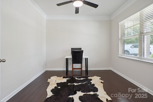 office area featuring dark wood-type flooring, crown molding, a ceiling fan, and baseboards