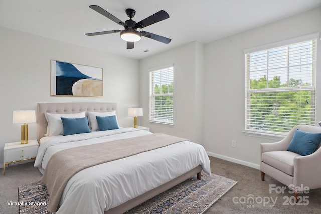 bedroom featuring carpet, baseboards, and ceiling fan