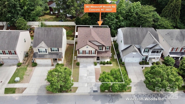 aerial perspective of suburban area featuring property boundaries highlighted