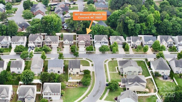 392 Winecoff Woods Dr NW, Concord, NC 28027 - aerial perspective of suburban area