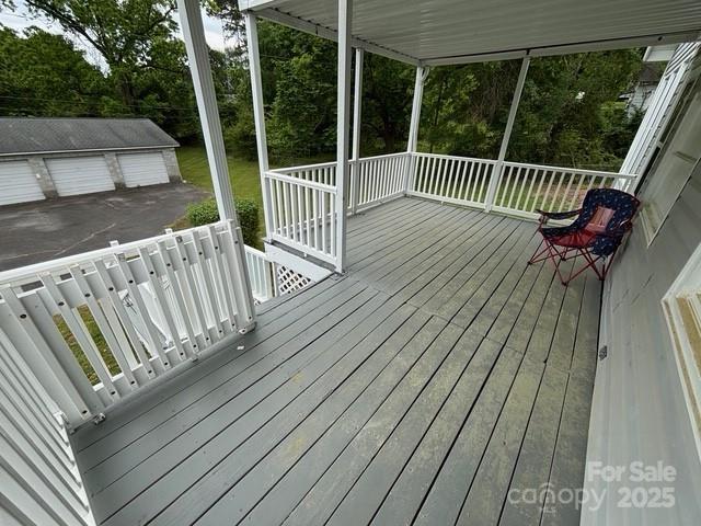 103 Duke St, Great Falls, SC 29055 - wooden terrace with an outbuilding and a garage