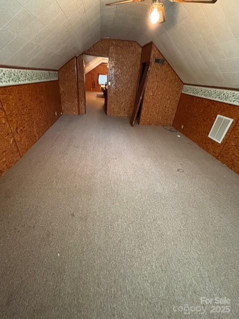 103 Duke St, Great Falls, SC 29055 - additional living space featuring carpet floors, ceiling fan, and vaulted ceiling