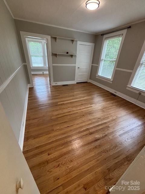 103 Duke St, Great Falls, SC 29055 - unfurnished room featuring wood finished floors, crown molding, and baseboards