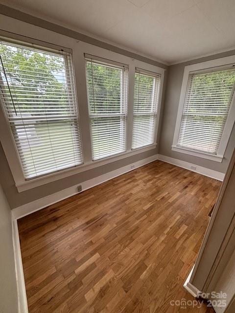 103 Duke St, Great Falls, SC 29055 - unfurnished room featuring light wood-type flooring, baseboards, and crown molding