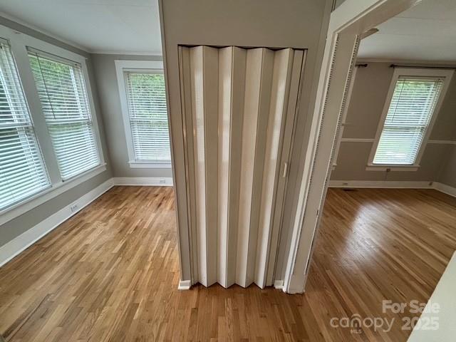 103 Duke St, Great Falls, SC 29055 - detailed view of baseboards, ornamental molding, and wood finished floors