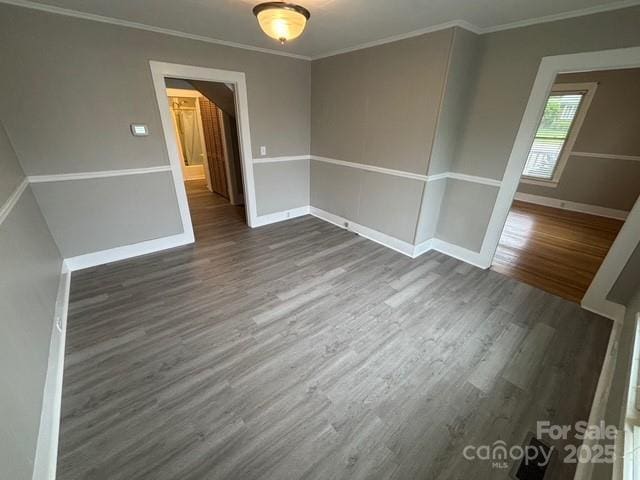 103 Duke St, Great Falls, SC 29055 - unfurnished room featuring dark wood-style floors, baseboards, and crown molding