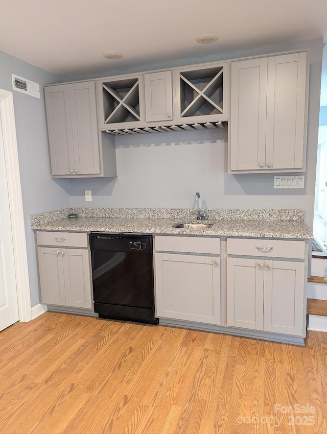 715 Gentry Pl, Charlotte, NC 28210 - indoor wet bar featuring dishwasher and light wood-style floors