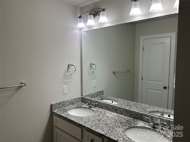 bathroom featuring double vanity