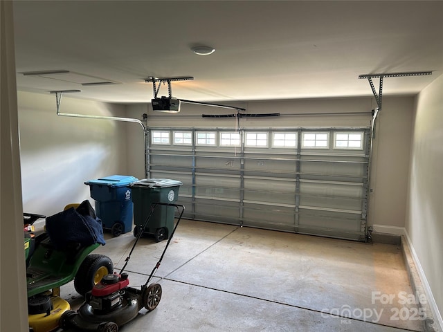 garage featuring a garage door opener