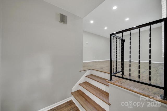 8514 Timber Crest Cir, Charlotte, NC 28226 - stairs featuring wood finished floors, recessed lighting, and baseboards
