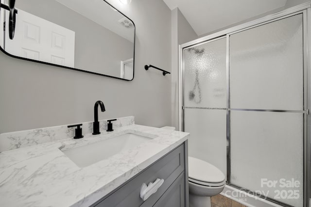 8514 Timber Crest Cir, Charlotte, NC 28226 - full bathroom featuring toilet, a stall shower, vanity, and wood finished floors