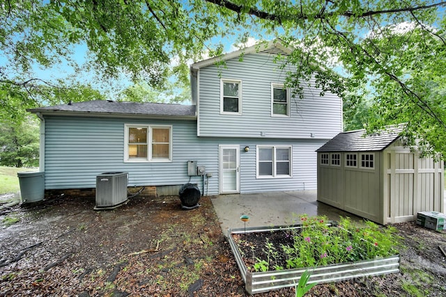 8514 Timber Crest Cir, Charlotte, NC 28226 - rear view of property with a patio area, central AC, a storage unit, and an outdoor structure