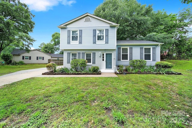 8514 Timber Crest Cir, Charlotte, NC 28226 - view of front facade featuring a front yard and brick siding