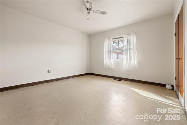 324 Horn Bottom Rd, Forest City, NC 28043 - spare room featuring tile patterned floors and baseboards