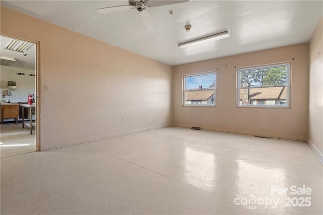 324 Horn Bottom Rd, Forest City, NC 28043 - unfurnished room featuring ceiling fan and baseboards