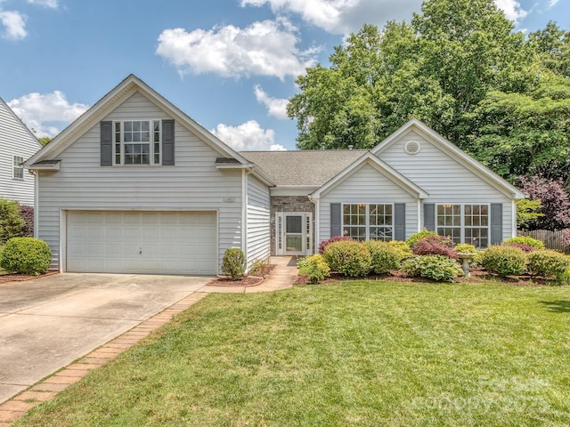 3066 Orion Dr, Fort Mill, SC 29707 - view of front facade featuring concrete driveway, a front lawn, and roof with shingles