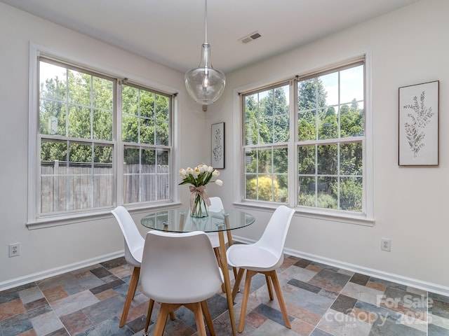 3066 Orion Dr, Fort Mill, SC 29707 - dining area featuring baseboards and stone finish flooring