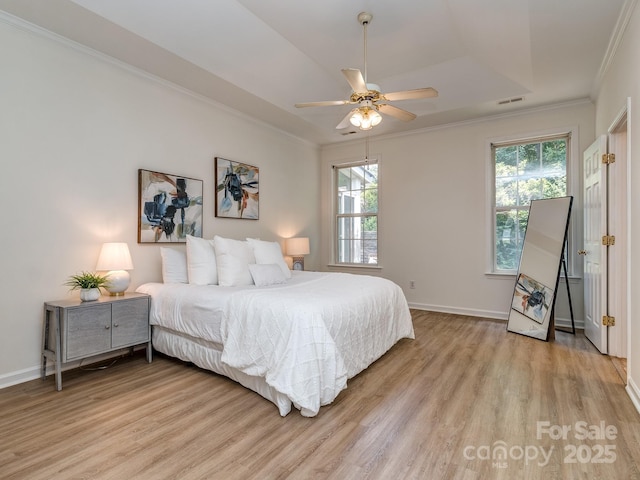 3066 Orion Dr, Fort Mill, SC 29707 - bedroom featuring light wood-style floors, crown molding, multiple windows, baseboards, and ceiling fan