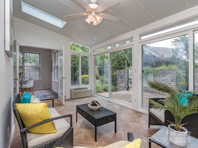 3066 Orion Dr, Fort Mill, SC 29707 - sunroom featuring lofted ceiling, a ceiling fan, a skylight, an outdoor hangout area, and an AC wall unit
