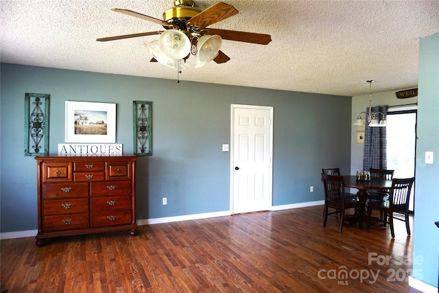 1958 19th Avenue Dr NE Unit 8, Hickory, NC 28601 - dining space with ceiling fan, dark wood finished floors, a textured ceiling, baseboards, and a chandelier