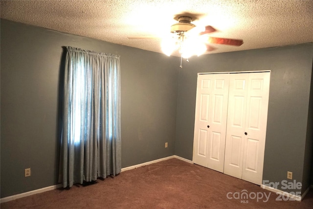 1958 19th Avenue Dr NE Unit 8, Hickory, NC 28601 - unfurnished bedroom with carpet flooring, a closet, ceiling fan, baseboards, and a textured ceiling