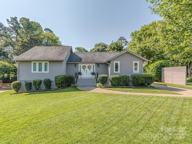 214 Wilcrest Dr, Matthews, NC 28105 - view of front of home featuring a front yard and a shingled roof