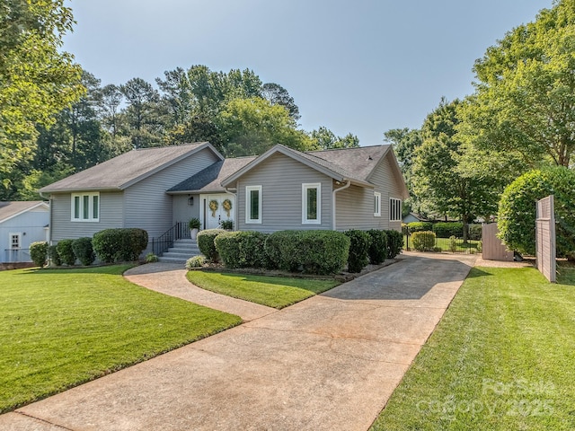 214 Wilcrest Dr, Matthews, NC 28105 - ranch-style home with driveway, a front yard, and a shingled roof
