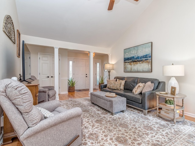 214 Wilcrest Dr, Matthews, NC 28105 - living area with ornate columns, wood finished floors, baseboards, high vaulted ceiling, and ceiling fan