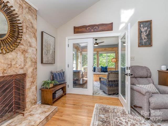 214 Wilcrest Dr, Matthews, NC 28105 - living room featuring french doors, wood finished floors, vaulted ceiling, and a ceiling fan