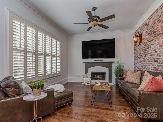 1404 Lookout Cir, Waxhaw, NC 28173 - living area featuring ceiling fan, a fireplace, wood finished floors, ornamental molding, and baseboards