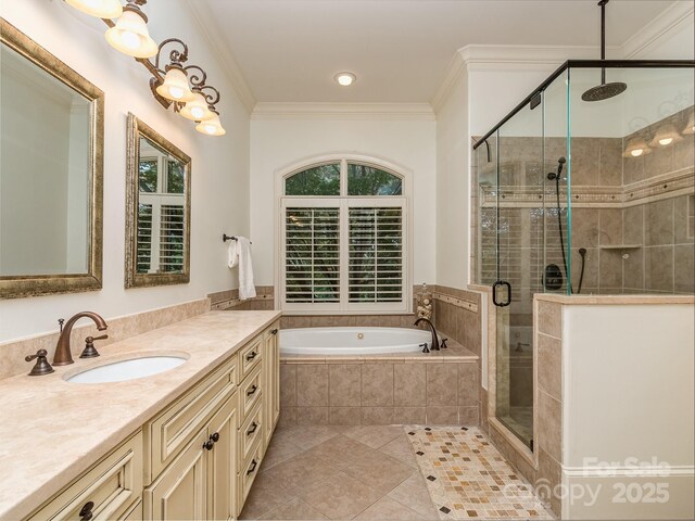 1404 Lookout Cir, Waxhaw, NC 28173 - full bath with tile patterned floors, vanity, a garden tub, a stall shower, and crown molding