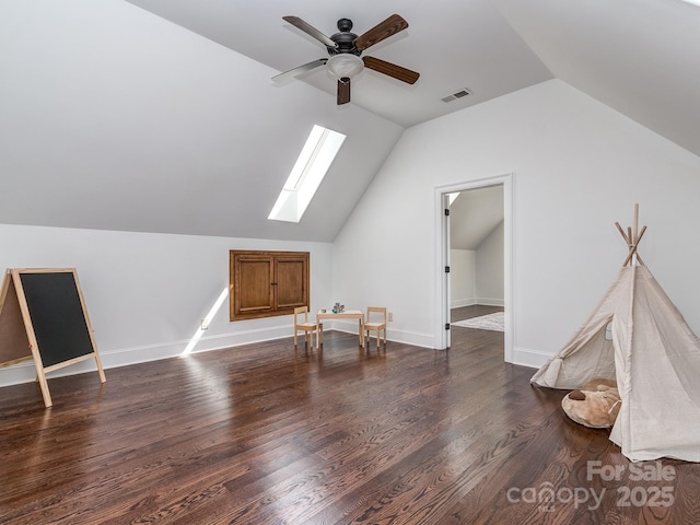 1404 Lookout Cir, Waxhaw, NC 28173 - additional living space with a skylight, a ceiling fan, vaulted ceiling, wood finished floors, and baseboards