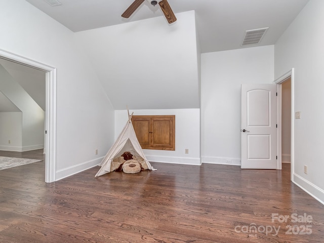 1404 Lookout Cir, Waxhaw, NC 28173 - rec room featuring a ceiling fan, dark wood-style flooring, baseboards, and vaulted ceiling