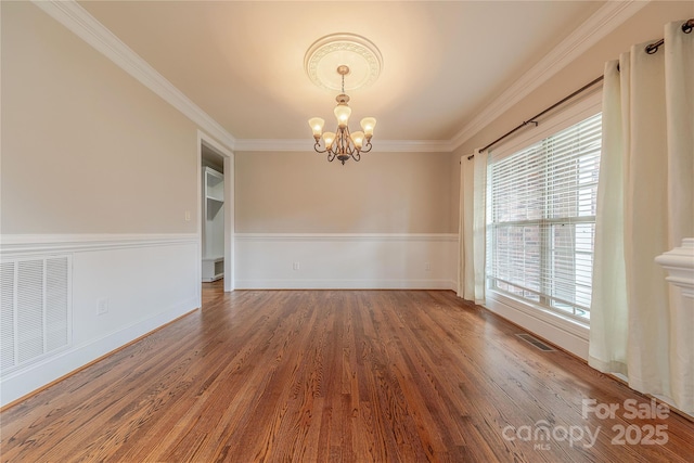 4113 Hoffmeister Dr, Waxhaw, NC 28173 - unfurnished room with a chandelier, ornamental molding, wood finished floors, and baseboards