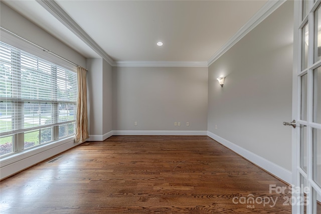 4113 Hoffmeister Dr, Waxhaw, NC 28173 - spare room featuring plenty of natural light, crown molding, baseboards, wood finished floors, and recessed lighting