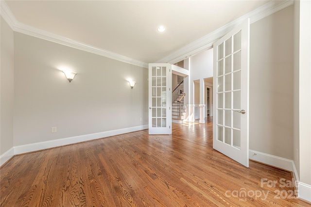 4113 Hoffmeister Dr, Waxhaw, NC 28173 - unfurnished room with french doors, ornamental molding, baseboards, wood finished floors, and stairs