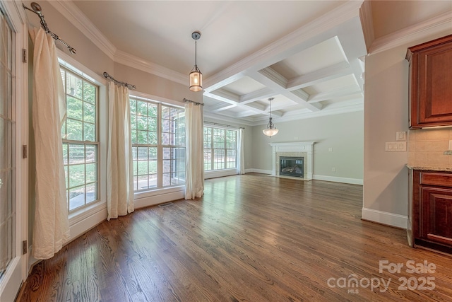 4113 Hoffmeister Dr, Waxhaw, NC 28173 - unfurnished living room featuring dark wood-type flooring, beam ceiling, baseboards, ornamental molding, and a glass covered fireplace